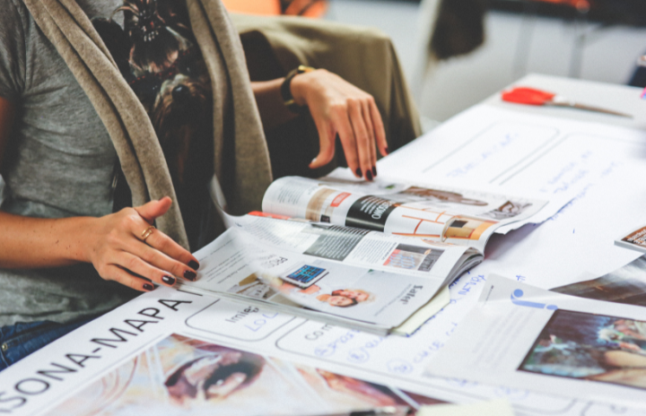 A girl looking at a magazine