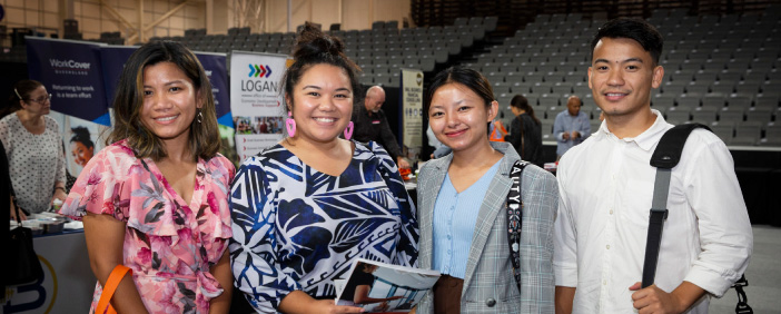young people standing at the multicultural small business expo