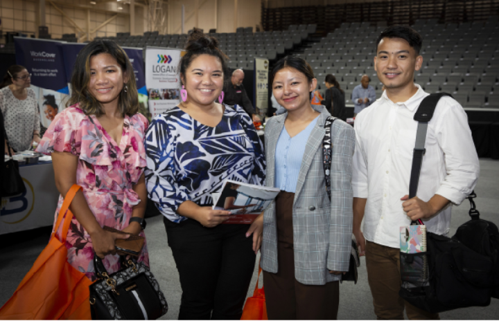 young people standing at the multicultural small business expo