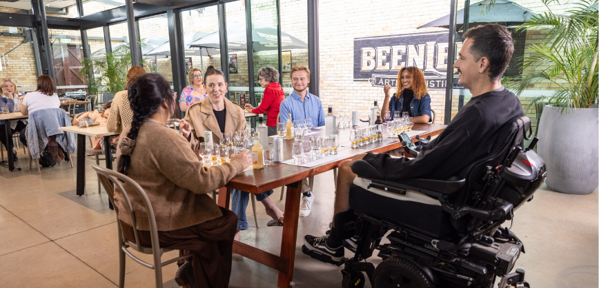 Group of people enjoying a tasting session at Beenleigh Artisan Distillery