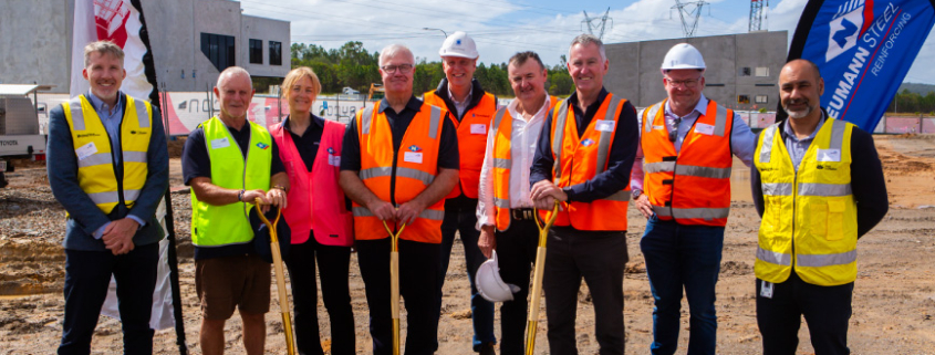 Representatives from Newmann Steel, Stockland and Logan City Council at sod turn ceremony