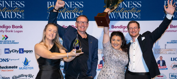 B&C Plastics staff holding trophies
