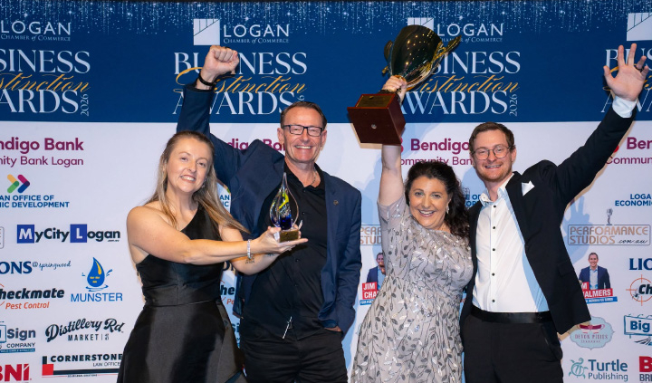 B&C Plastics staff holding trophies